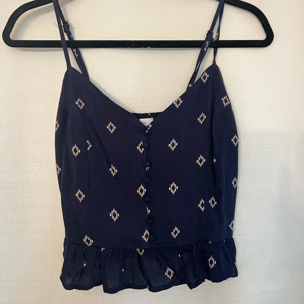 adjustable straps. Very flattering and barely worn